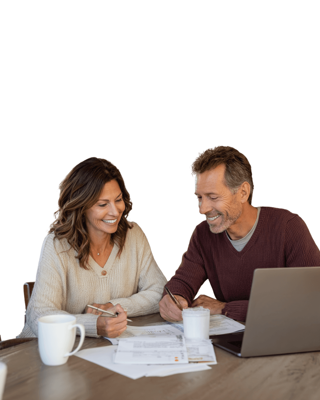Two people reviewing mortgage options together at a kitchen table